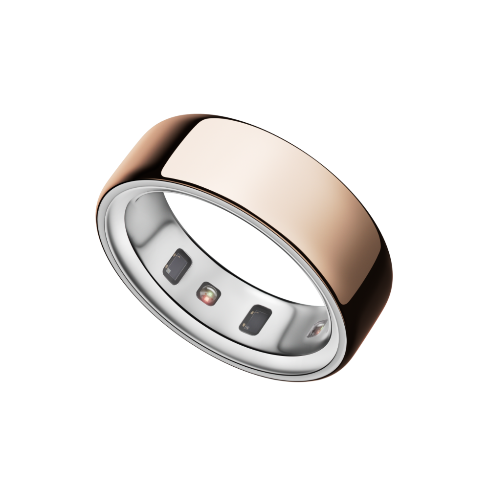 A polished smart ring on a light surface